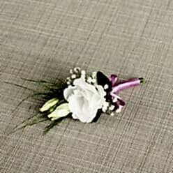 WHITE LISIANTHUS GROOM BUTTONHOLE